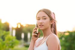 Teen girl using smartphone