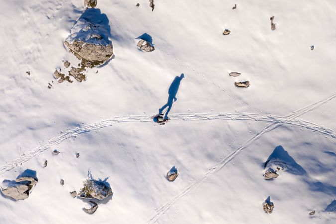 Anonymous skiing in mountainous terrain in winter