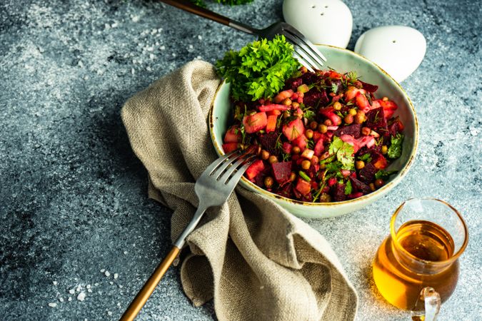 Organic beetroot salad on stone background with copy space