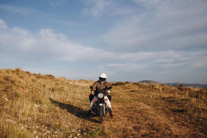 Man off roading on a motorcycle