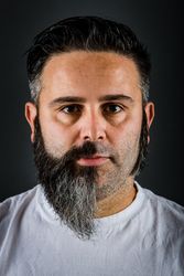 Confident man with half beard