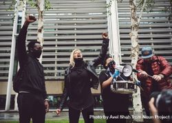 London, England, United Kingdom - June 6th, 2020: Group of people at BLM protest with raised fists 5pgyx0