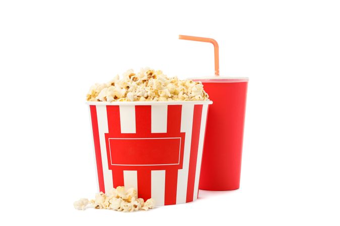 Bucket with popcorn and paper cup isolated on blank background