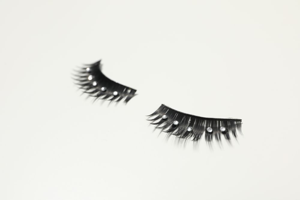 concept of cosmetology tools and beauty treatment, false eyelashes