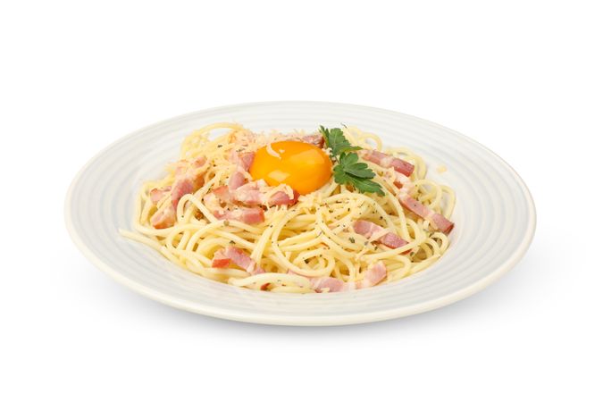 Plate with tasty pasta isolated on plain background