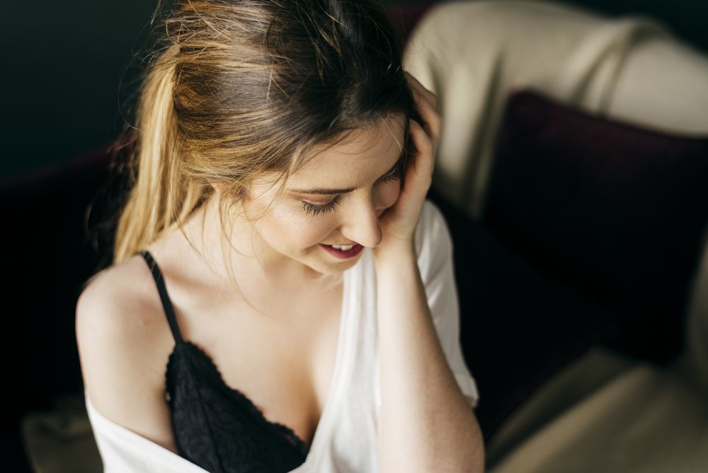 woman touching face