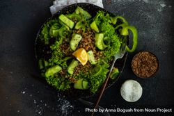 Top view of green fresh salad on concrete background with copy space 5oDqG9