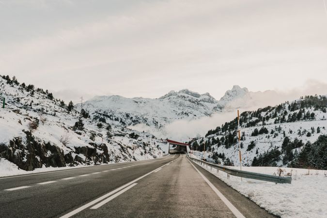 Countryside road between snow hills