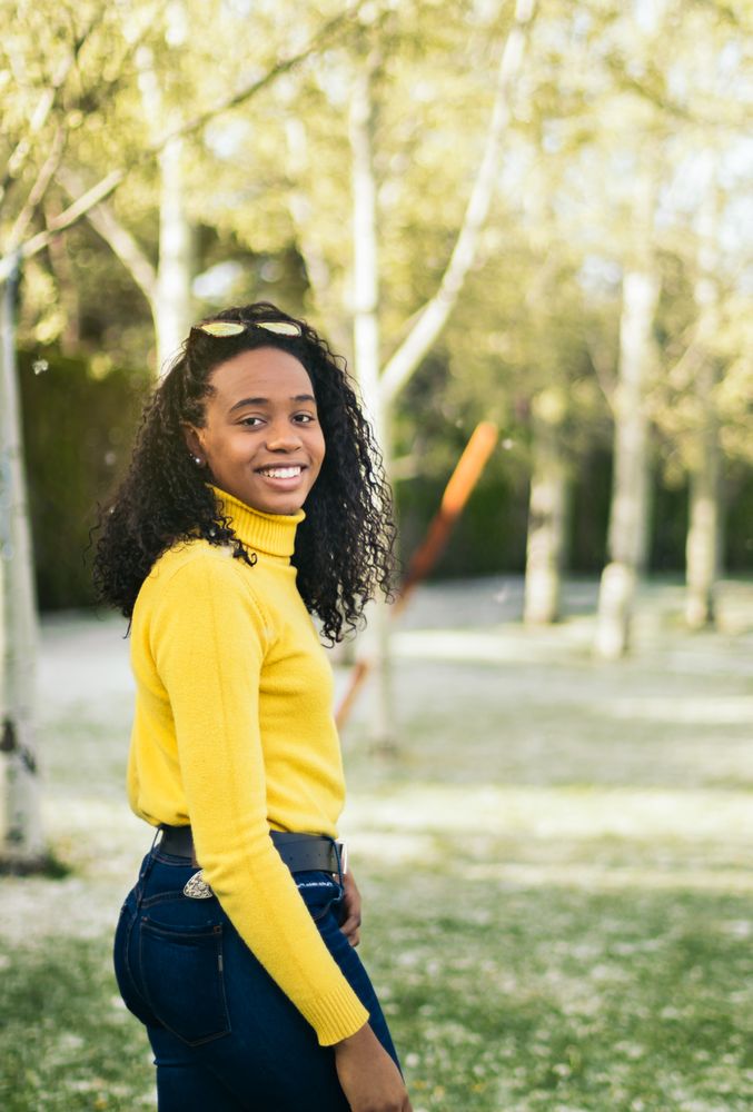 Black girl portrait smiling in a park