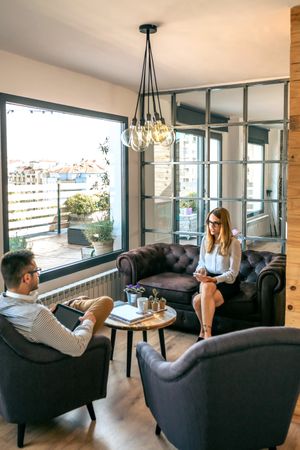 Man and woman in an informal business meeting