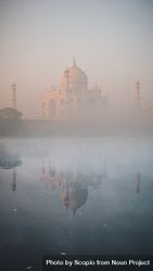 Taj mahal, India in fog with reflection on water 5aM9d5