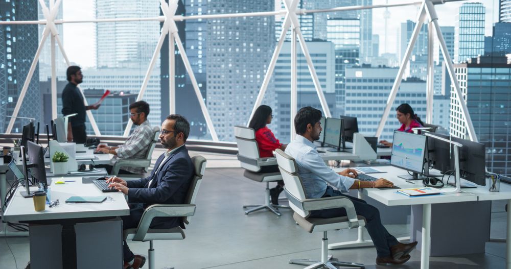 Team of Talented Young Indian Professionals Working in a Corporate Hedge Fund.