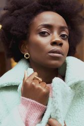 Portrait of woman in turquoise jacket