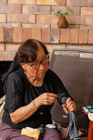 Yarn dreams: woman's creative escape.