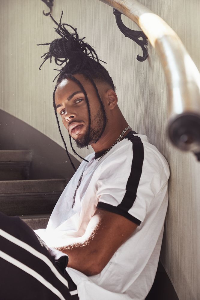 Black male with trendy hairstyle