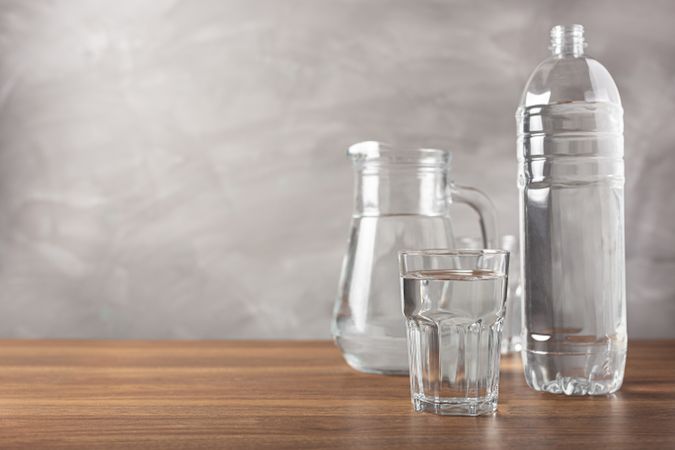 Glass of fresh water on the table.