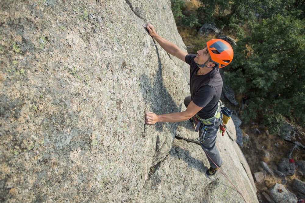 Man climbing a rock