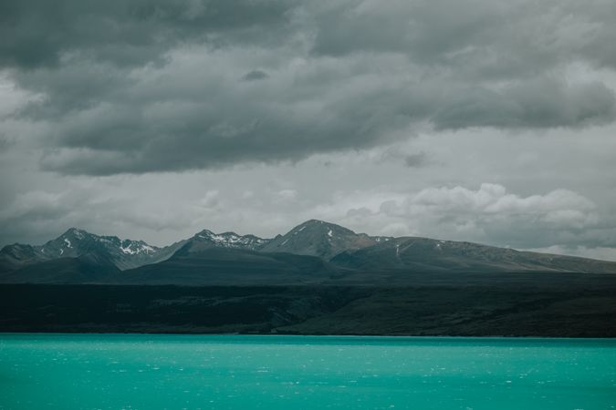 Sea coast with turquoise water and rocky mountains