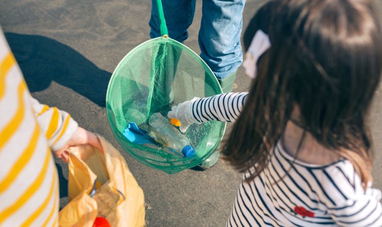 Volunteers taking garbage out of the sea