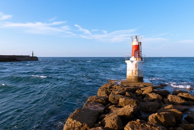 Lighthouse on rocky coastline
