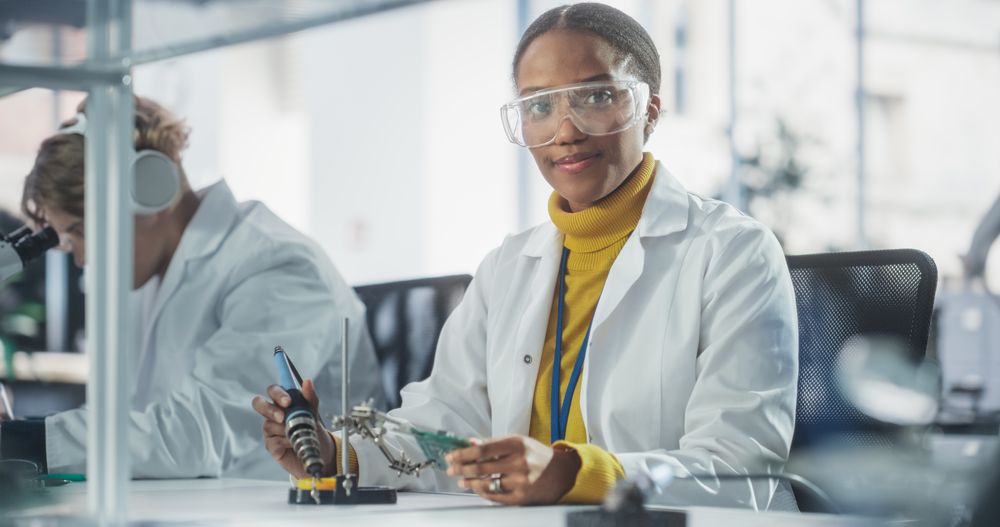 Diverse Team of Multiethnic Young Scientists Passing Internship in a Modern High Tech Laboratory.