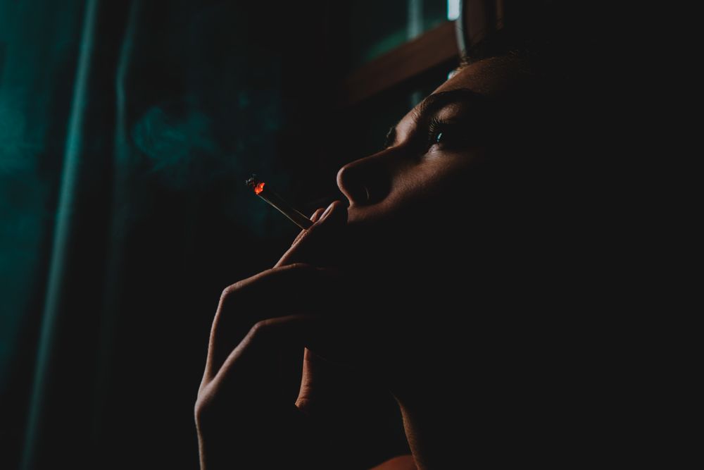 Moody shot of woman smoking