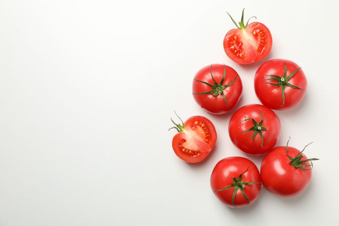 Fresh ripe tomatoes on neutral background, top view