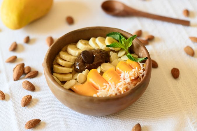 Bowl with delicious healthy snacks
