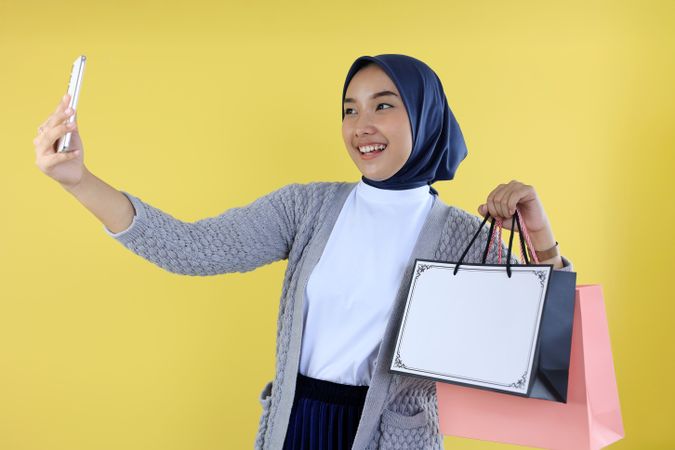 Young Asian Female Selfie with with Paperbag