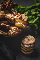 Dates fruits with walnuts, mint and cinnamon for Ramadan