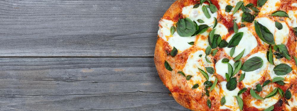 Freshly cooked homemade tomato and cheese pizza