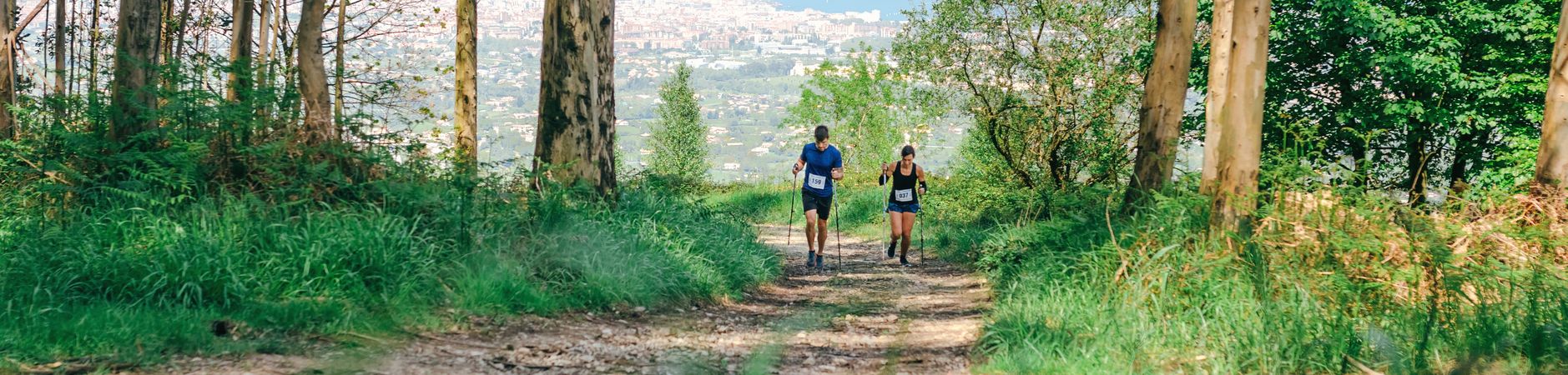 Young woman and man doing trail