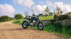 Custom motorcycle parked on the road
