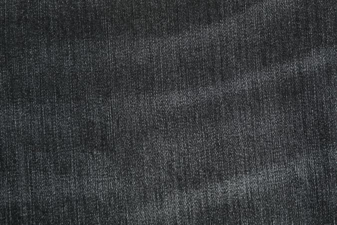 Texture of jeans as background, space for text
