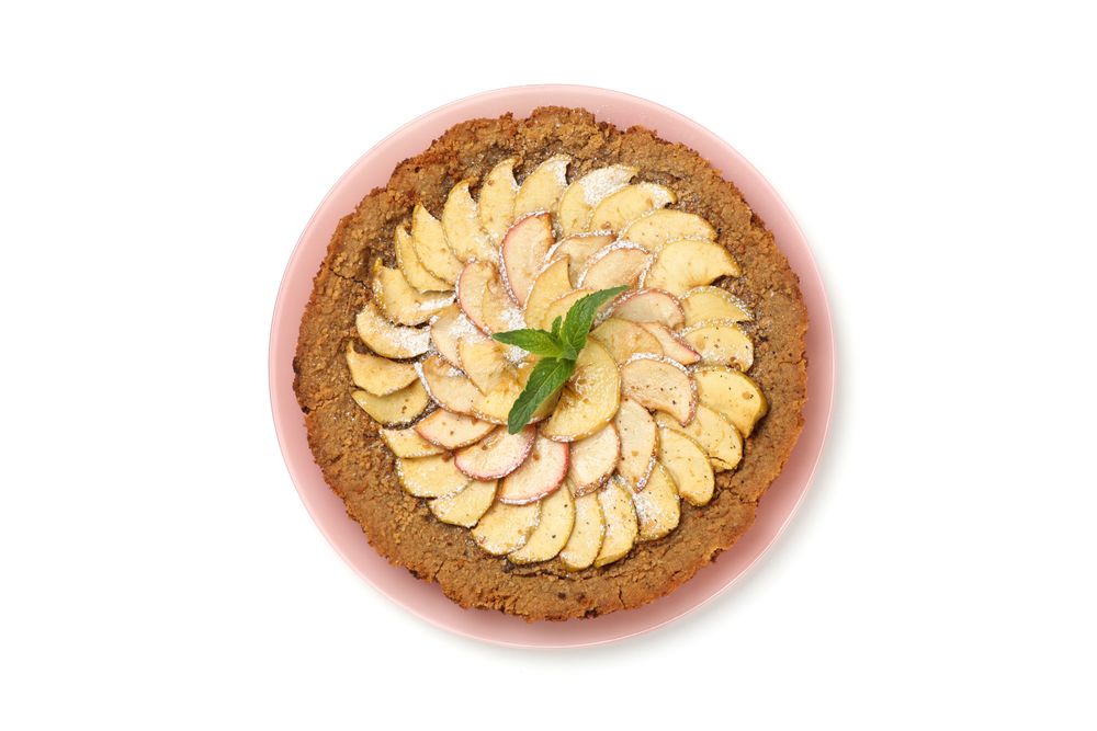 Plate with tasty apple pie isolated on plain background