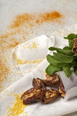 Dates fruits with walnuts, mint and cinnamon for Ramadan