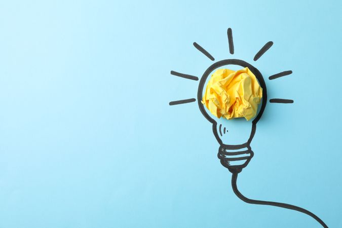 Drawn light bulb on blue background. Good idea concept