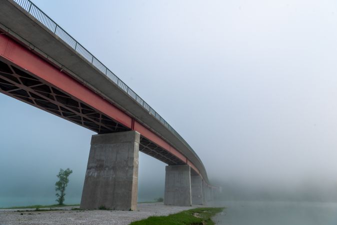 Bridge Sylvenstein on a foggy morning, side view from under the bridge