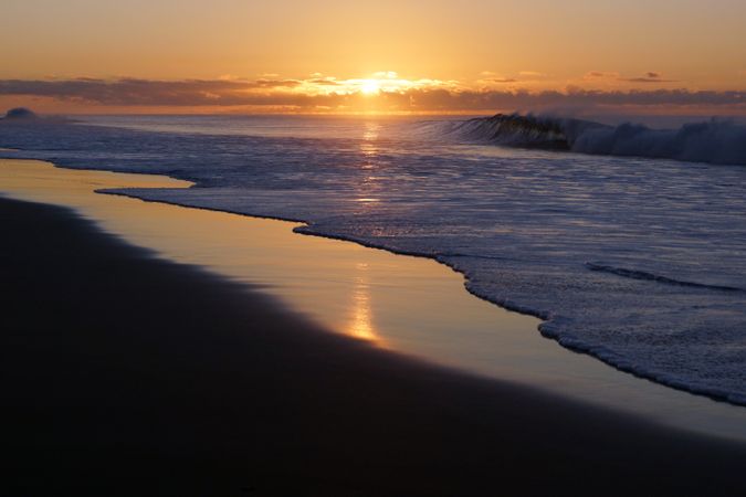 Colorful sunset over peaceful seashore