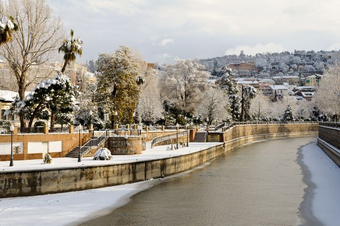 Icy river after snow storm in Granada, Spain
