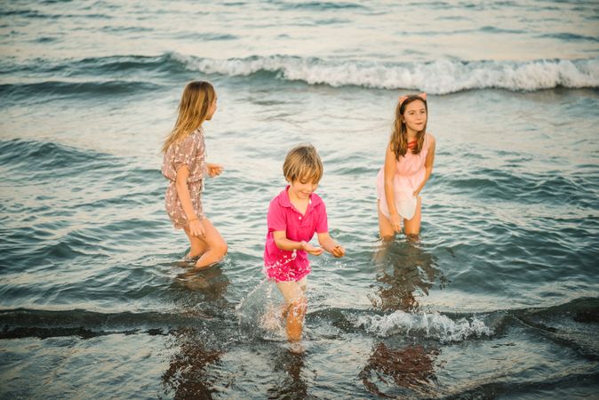 Kids playing in shallow water
