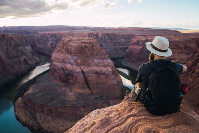 Bearded traveler looking at canyon