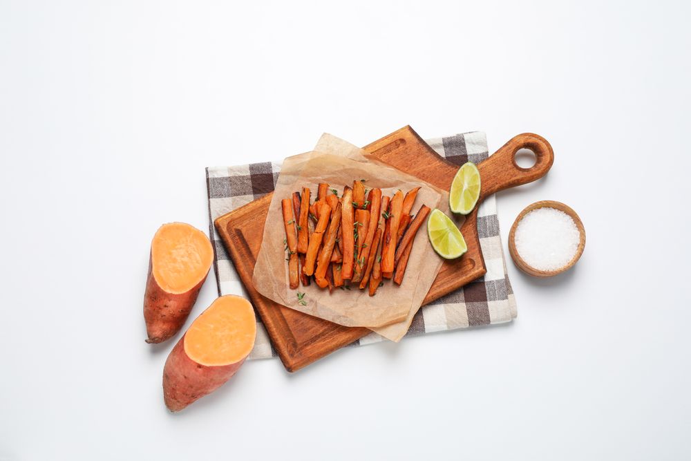 Concept of tasty food, fried sweet potato, top view