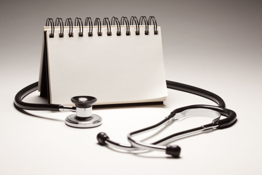 Spiral Note Pad and Stethoscope