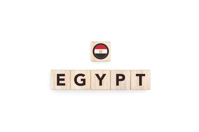 Wooden blocks bearing the name and flag of Egypt.