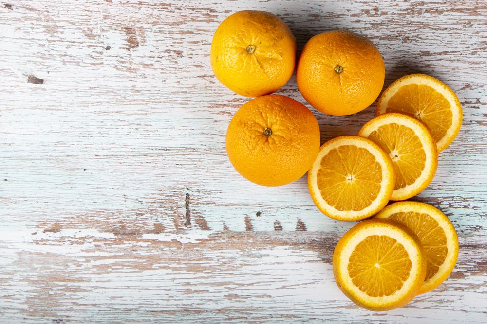 Sliced oranges on the table.
