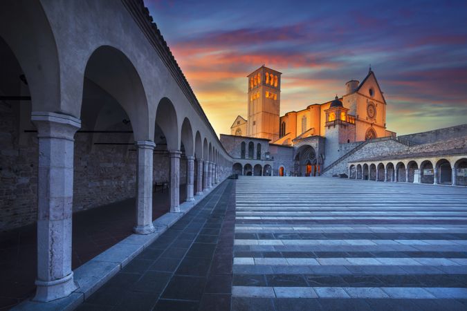 Assisi, San Francesco Basilica church at sunset, Umbria, Italy