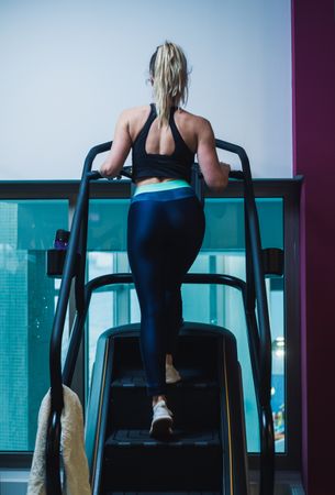 woman on exercise machine