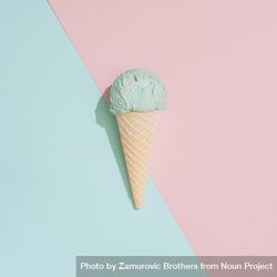 Ice cream on pastel pink and blue background 0Kg7M0