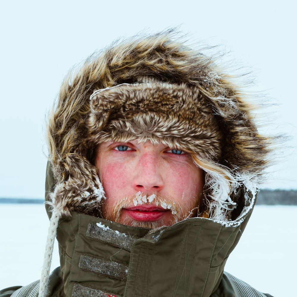 Portrait of man in fur coat